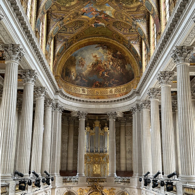 Gold, myth, and movement unfold across the ceilings of Versailles.