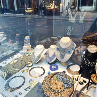 Jewellery, objects and artisan pieces sit comfortably beside galleries and cafés on Rue Bonaparte.