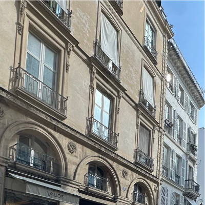 Paris above the canvases
On Rue de Seine, contemporary art lives beneath classical Parisian façades, where iron balconies and weathered stone have watched generations of artists arrive and disappear.