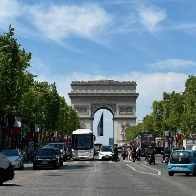 The Champs-Élysées unfolds toward the Arc de Triomphe, one of Paris’ most iconic urban perspectives. Lined with trees, cafés, luxury boutiques and constant city movement, this grand avenue remains a symbol of Parisian life, celebration and elegance.
