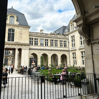 Historic perfume houses and elegant boutiques showcase the timeless French craftsmanship that has long attracted visitors to the Marais.