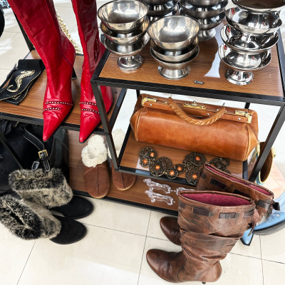 Bold boots, vintage leather bags and unique home décor capture the eclectic spirit of the Marais.