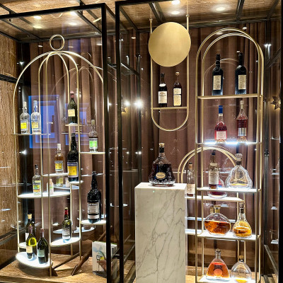 A refined display of rare spirits and fine bottles, reflecting the quiet luxury and attention to detail inside Hôtel de Crillon.