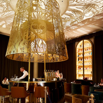 A small, intimate bar where iconic cocktails are served with timeless Ritz elegance.