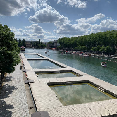 During the summer months, the Bassin de la Villette transforms into one of Paris's most popular outdoor leisure areas, with supervised swimming pools, floating pontoons, pedal boats and waterfront cafés. It is one of the city's favourite places to cool off while enjoying the lively atmosphere along the Canal de l'Ourcq.