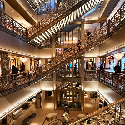 The Heart of RH Paris
The multi-level atrium is one of the gallery's most striking spaces, combining dramatic staircases, custom furnishings, artwork, and architectural details beneath warm ambient lighting.