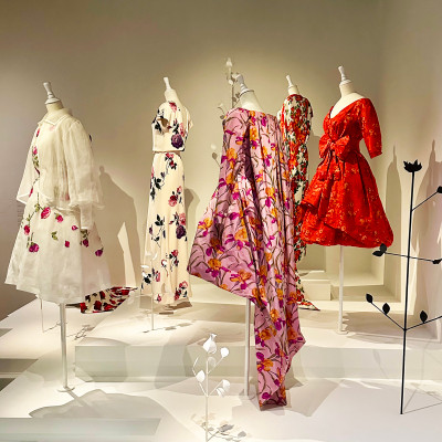 A Celebration of Colour and Movement
Floral prints, flowing fabrics and vibrant silhouettes showcase Yves Saint Laurent's ability to transform nature into fashion. The exhibition highlights how colour and craftsmanship became signatures of the designer's enduring style.