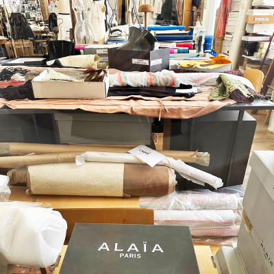 Inside Alaïa's Creative Universe
This rare glimpse into the atelier reveals the materials, sketches, fabrics, and working environment behind one of fashion's most celebrated designers, highlighting the craftsmanship that defined his work.