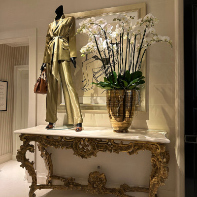 A sculptural moment inside — where tailoring meets art, texture, and quiet luxury.