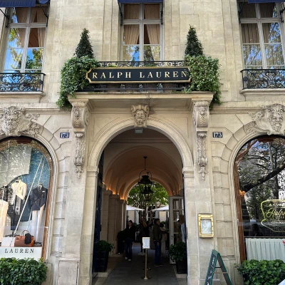 A discreet entrance on Boulevard Saint-Germain, opening into Ralph Lauren’s private Paris world.