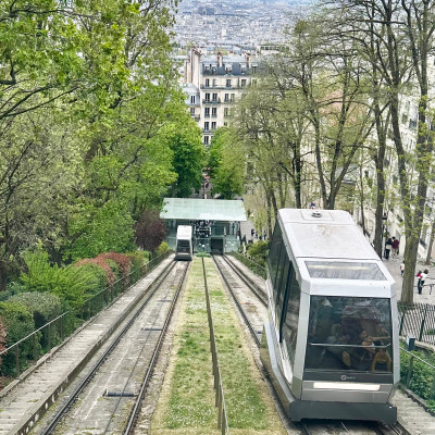 Funicular to Sacré-Cœur — The Montmartre funicular offers an easy alternative to the steep climb, with views opening across Paris as you reach the basilica.