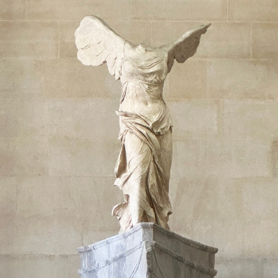 A timeless silhouette of the Winged Victory of Samothrace — one of the Louvre’s most iconic treasures. Captured by TLC Paris.