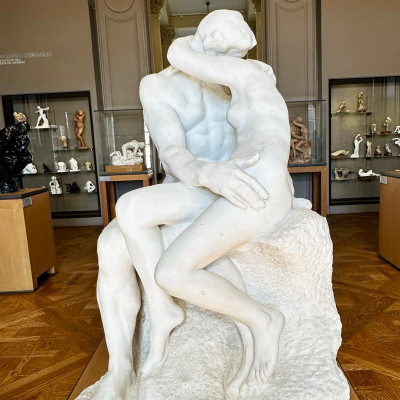 One of Rodin’s most celebrated sculptures, The Kiss captures a moment of intimacy and emotion in marble. Displayed inside the museum, it remains one of the highlights of the permanent collection.