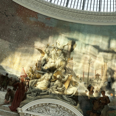 At the heart of the Bourse de Commerce, contemporary installations unfold beneath the vast glass dome, creating a dialogue between past and present.