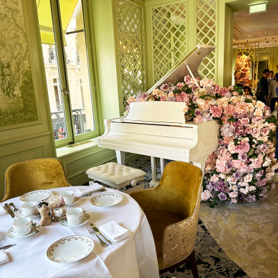 Soft colours, floral arrangements, and decorative details create the romantic atmosphere that has become synonymous with the Ladurée experience.