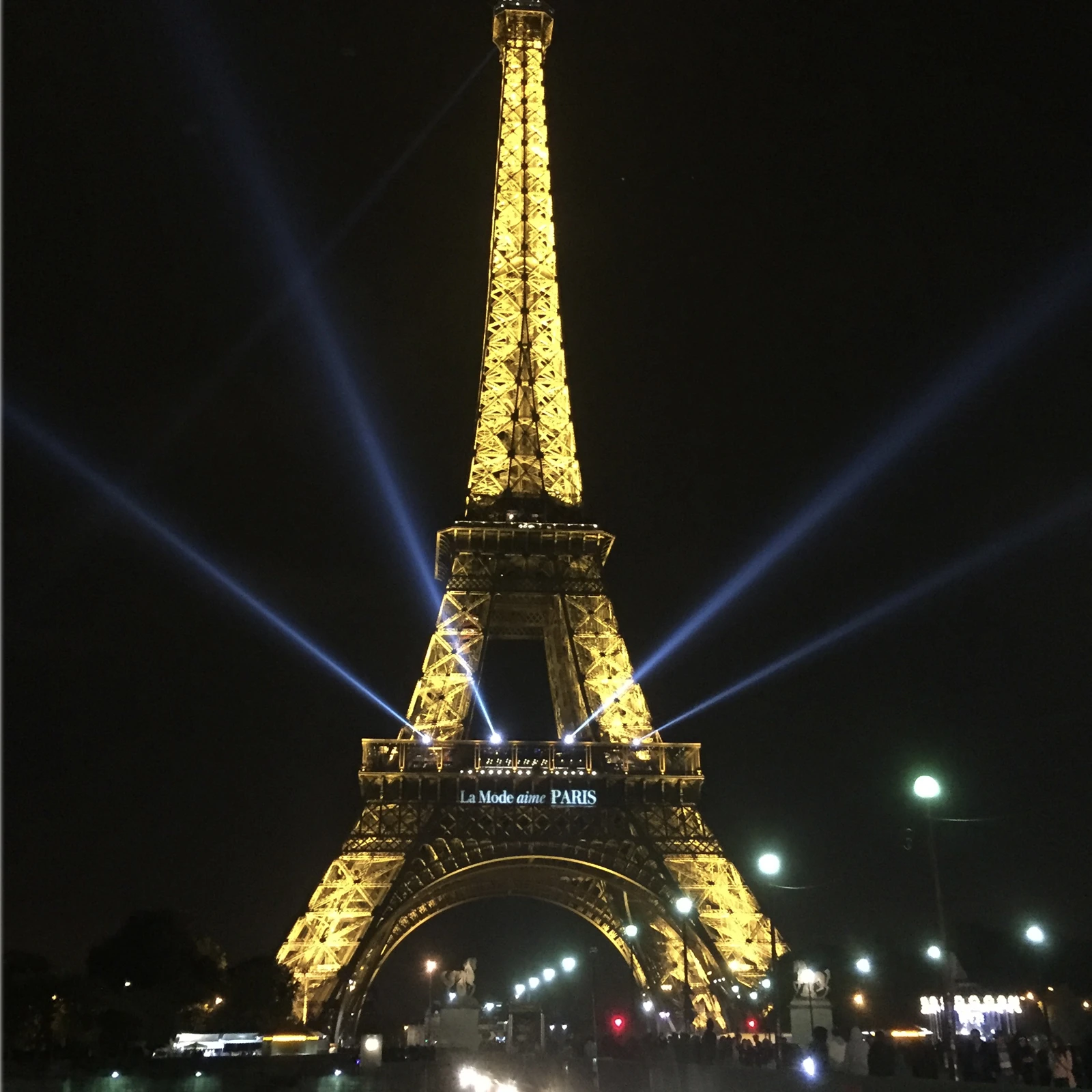 Eiffel Tower illuminated at night in Paris