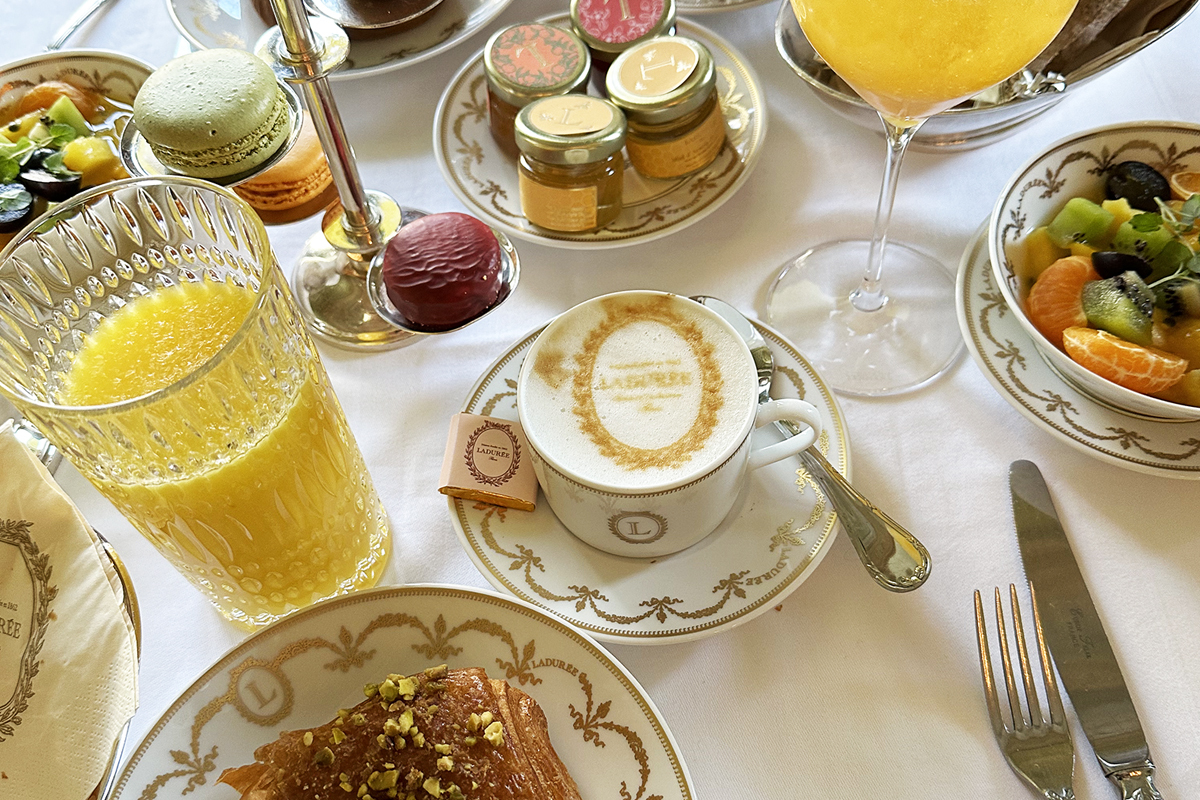 A Ladurée brunch combines fresh pastries, seasonal fruit, coffee, and the maison’s famous macarons in one of Paris’s most iconic settings.