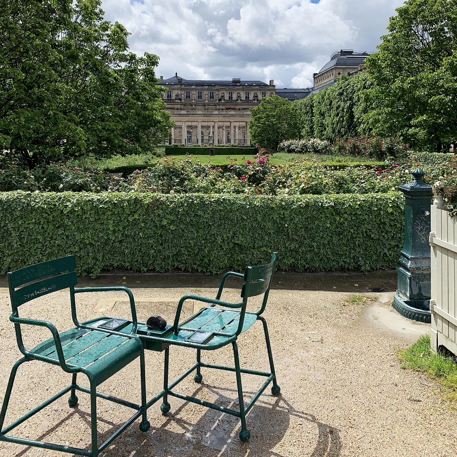 Palais Royal garden and green chairs in Paris
