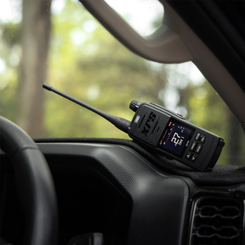 XRS-660 handheld UHF CB radio mounted in vehicle