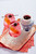Spritz cocktail garnished with Fabbri amarena cherries