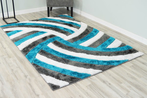 Full view of the shag rug laid out showing design detail.