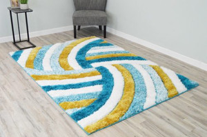Full view of the pinwheel shag rug laid out showing detailed design. Full view of the pinwheel shag rug laid out showing detailed design.