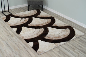 Full view of the shag rug laid out showing detail.