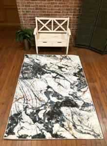 Full view of the rug laid out showing design details.