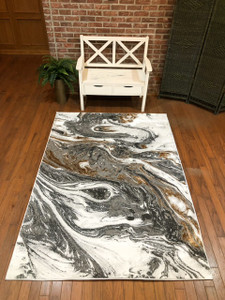 Full view of the rug laid out showing design details.