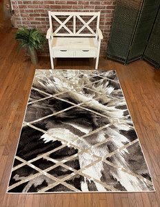Full view of the rug laid out showing design details.