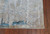 Close up of the corner of the Spackle rug showing details of the stitching and the texture of the rug. Close up of the corner of the Spackle rug showing details of the stitching and the texture of the rug.