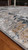 Close up on the rug displaying the design and the texture of the edge. Close up on the rug displaying the design and the texture of the edge.