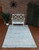 Full view of the Pebbles rug laid out showing design details. Full view of the Pebbles rug laid out showing design details.