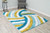 Full view of the pinwheel shag rug laid out showing detailed design. Full view of the pinwheel shag rug laid out showing detailed design.
