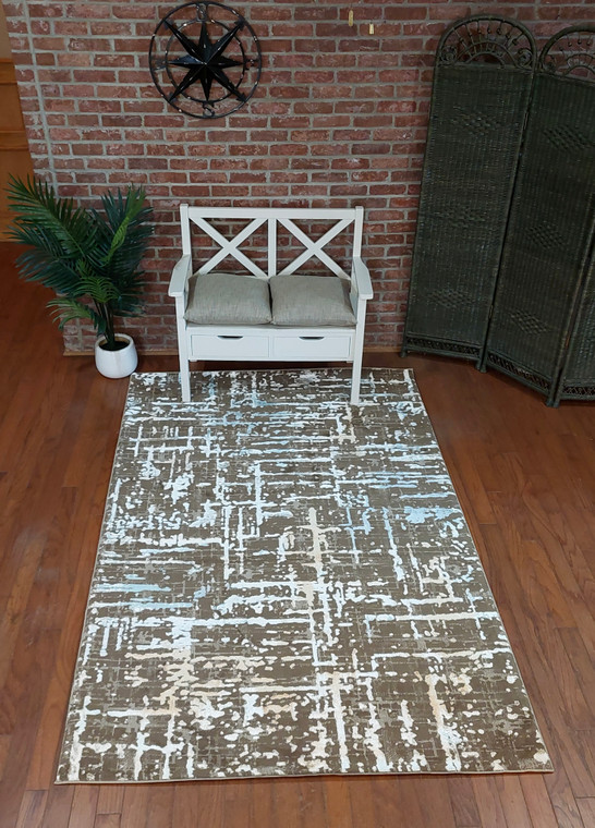 Full view of the Matrix rug in brown laid out showing design details.