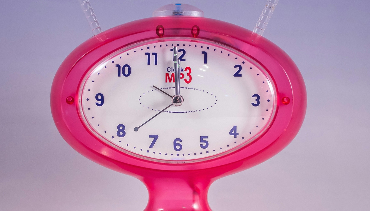 clear picking bins stacked to form a rainbow shape