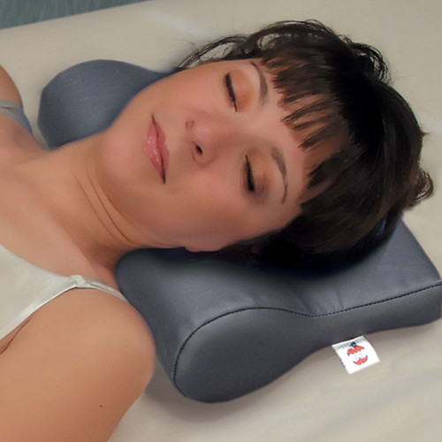 Vinyl Ab Contour Cervical Support Pillow in use. Vinyl Ab Contour Cervical Support Pillow in use.