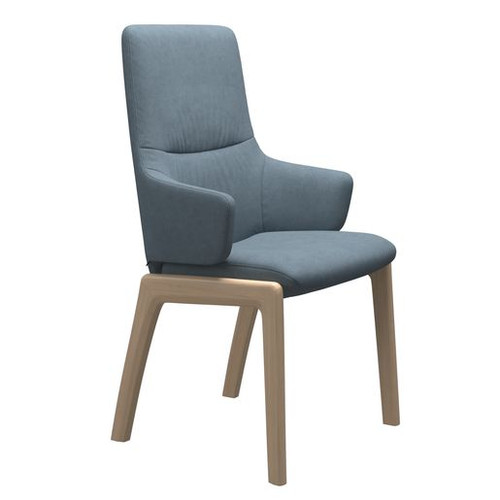 The Stressless Mint High-back dining room chair with arms and D100 wood legs.  The Stressless Mint High-back dining room chair with arms and D100 wood legs.