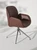 The Stressless Bay Low-back large dining chair with arms and D350 Chrome metal legs. 