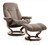 Medium Consul Stressless Recliner shown in Mole Batick Leather with Walnut wood. Medium Consul Stressless Recliner shown in Mole Batick Leather with Walnut wood.