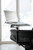 The Ekornes Laptop Table attaches easily to the wood base of most Stressless recliners. The Ekornes Laptop Table attaches easily to the wood base of most Stressless recliners.