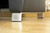 There are small, black buffers to protect your floors. There are small, black buffers to protect your floors.