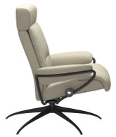 Stressless Tokyo Low-back, High-base Recliner with an adjustable headrest in Light Grey Paloma.