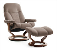 Medium Consul Stressless Recliner shown in Mole Batick Leather with Walnut wood.