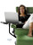 Ekornes Taurus shown with optional laptop table.