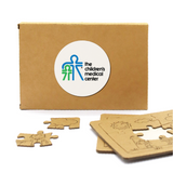 <p>Keep kids entertained with these fun and easy twelve-piece puzzles, made from recyclable craft cardboard. With two engaging designs, they’re a great way to spark creativity while making an eco-friendly choice. Packaged in a blank kraft box, they’re perfect for branding—turn playtime into a memorable experience!</p>
<p>Product Features</p>
<ul>
<li>Made from kraft cardboard</li>
<li>Eco-friendly</li>
<li>Twelve pieces</li>
<li>Two styles</li>
</ul>
