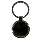 <p>Simple and sophisticated, our glossy circular keychain features a Gunmetal allure for a touch of modern luxury.</p>
