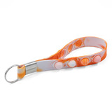 <p>Combining fun and functionality, this silicone popper keychain is a must-have accessory. Made from high-grade silicone, it features eight irresistible popper bubbles for stress relief and entertainment on the go. The durable metal split ring ensures secure attachment to keys, bags, or lanyards, making it a practical and playful addition to your everyday essentials. One size fits most, offering a convenient and enjoyable way to keep your hands busy wherever you are.</p>
<p><strong>*White Print Not Recommended*</strong></p>
