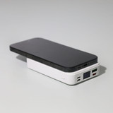 <p>Stay powered on the go with this compact yet powerful 5000mAh power bank. This powerbank is lightweight and easy to carry wherever you need it.</p>
<ul>
<li><strong>High-Speed Charging:</strong> Equipped with multiple output options, including USB and Type-C ports, delivering up to 12V/1.65A for fast, efficient charging.</li>
<li><strong>Wireless Charging:</strong> Enjoy hassle-free 15W wireless charging for your compatible devices.</li>
<li><strong>Versatile Inputs:</strong> Recharge the power bank itself via Type-C, Lightning, or Micro-USB with inputs of up to 12V/1.5A.</li>
<li><strong>LED Display:</strong> Stay informed with a sleek LED display that shows power levels at a glance.</li>
<li><strong>Multi-Device Charging:</strong> Charge multiple devices simultaneously, making it ideal for busy days or travel.</li>
</ul>
