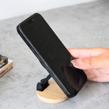 <p>Kulik Magnetic Phone Holder is the sleek, space-saving solution your desk needs. It folds down flat for easy storage and features a circular design with a stylish bamboo base and black stand. Strong magnetic hold keeps your phone secure while adding a natural touch to your workspace.</p>
